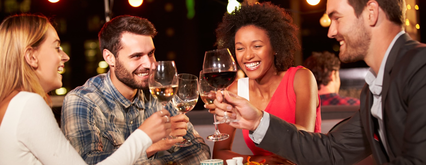 people cheering with drinks